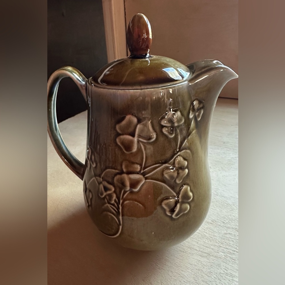 Elegant Floral porcelain pitcher used in good condition.